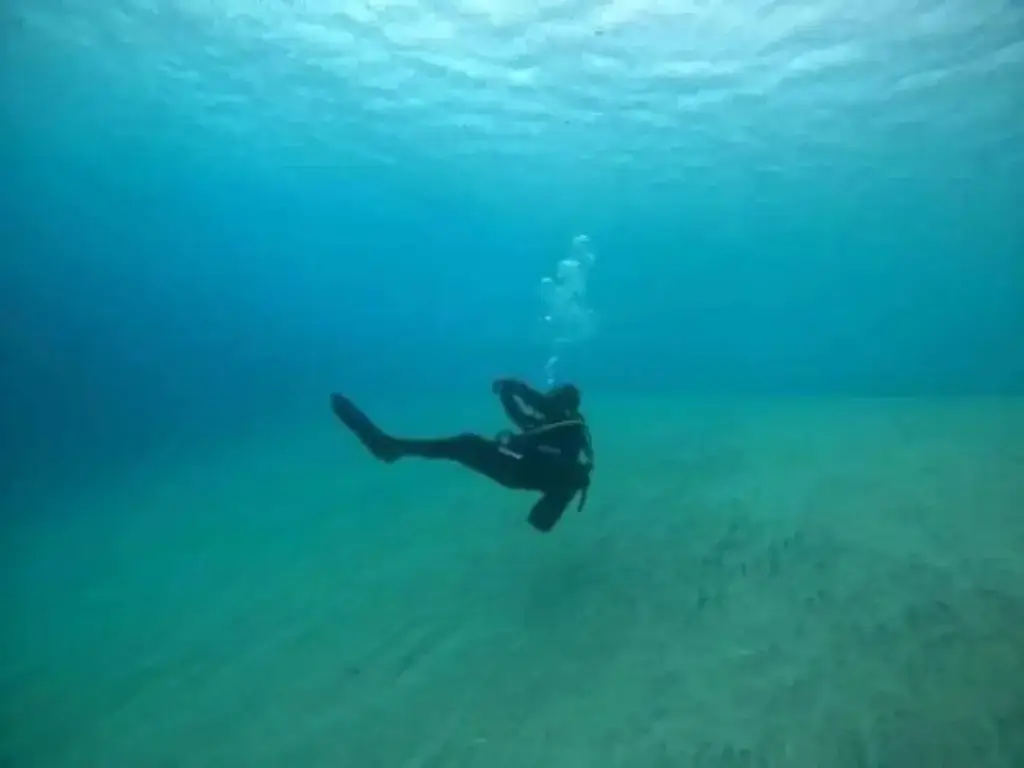 Scuba diver practising calm breathing and underwater relaxation in South Fuerteventura
